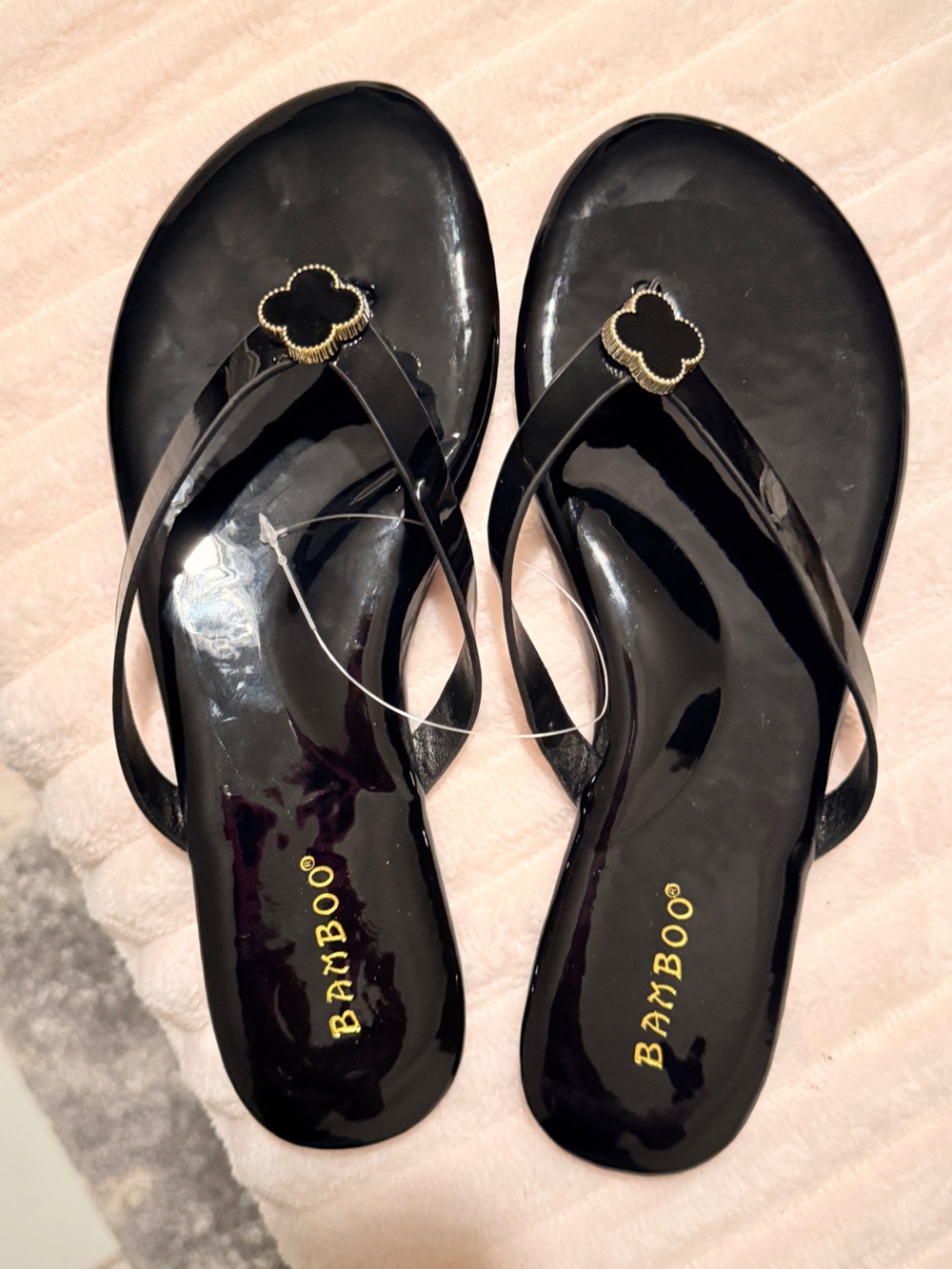 BAMBOO Black Patent Thong Sandals with Gold Clover Accent